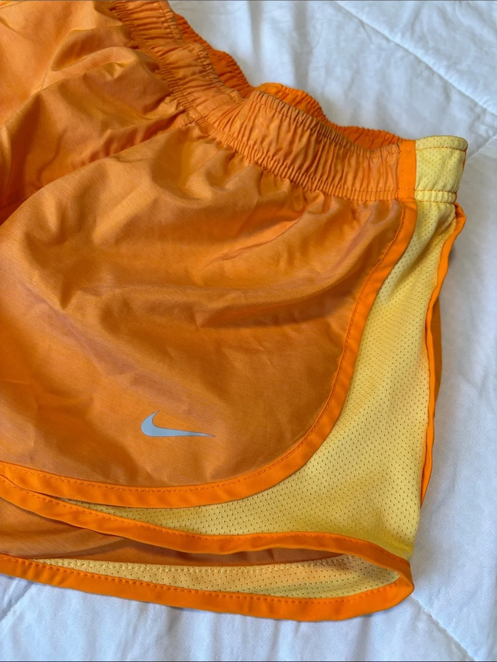 Nike Women's Bright Orange Athletic Shorts with Yellow Trim